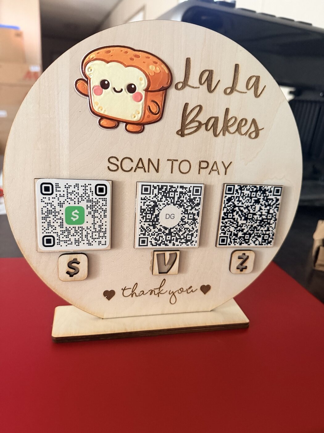 Personalized wooden scan-to-pay sign for La La Bakes